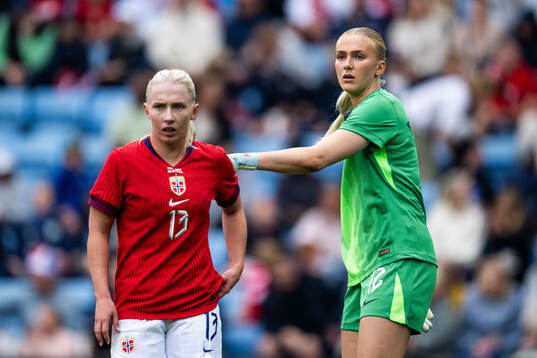 Thea Bjelde and goalkeeper Selma Panengstuen of Norway