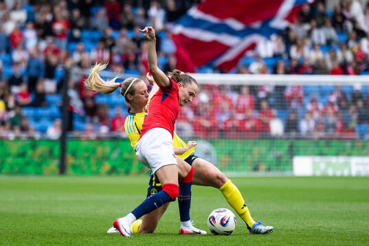 Amanda Ilestedt of Sweden and Caroline Graham Hansen of