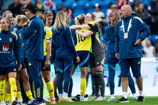 Sofia Jakobsson and goalkeeper Tove Enblom of Sweden