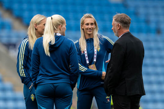 Ellen Wangerheim and head coach Peter Gerhardsson of Sweden