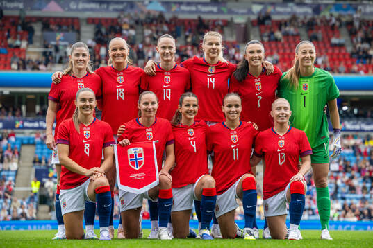 The starting eleven of Norway pose for a team photo