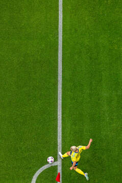 Jonna Andersson of Sweden takes a corner kick