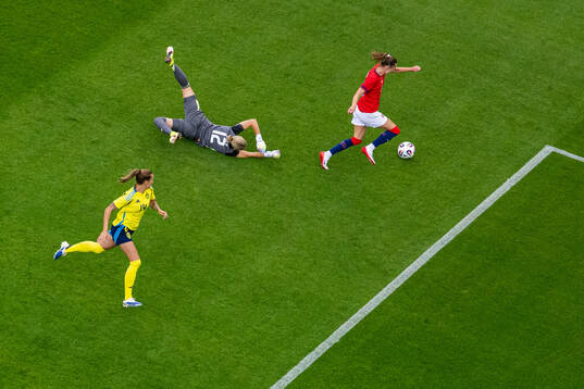 Nathalie Björn of Sweden, goalkeeper Jennifer Falk of
