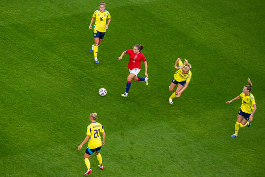 Guro Reiten of Norway in action against Hanna Bennison,