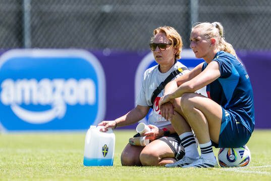 Physiotherapist Annika Näsmark and Stina Blackstenius of