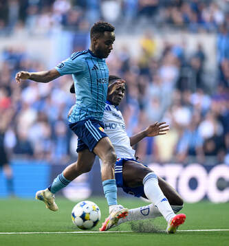 Djurgårdens Tokmac Nguen och IFK Norrköpings Kojo Peprah