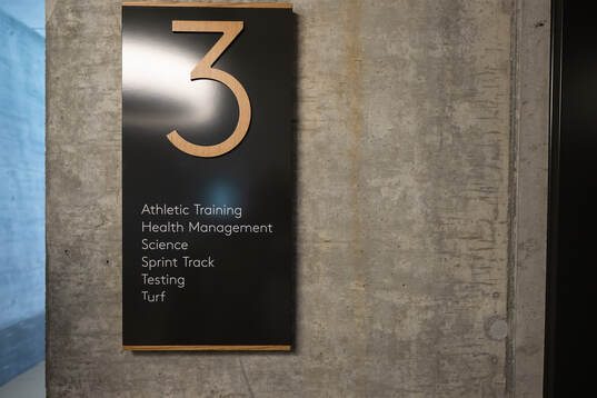 A sign displaying facilities is seen at a walk around at