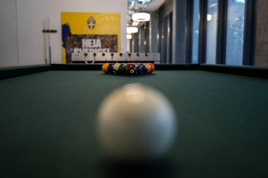A pool table is seen at a walk around at OYM the base camp