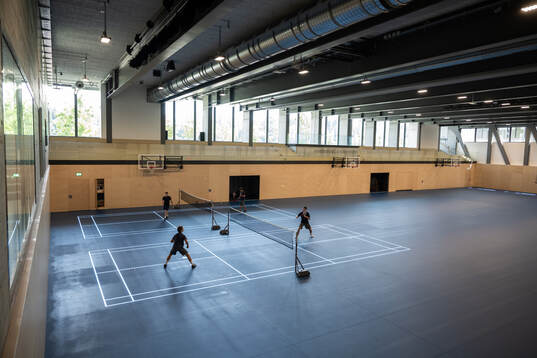 People playing badminton are seen at a walk around at OYM