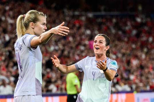 Ada Hegerberg of Norway celebrates with teammates