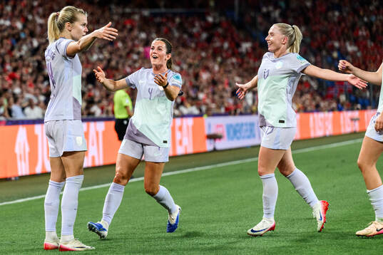 Ada Hegerberg of Norway celebrates with teammates