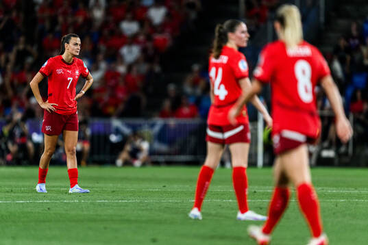 Riola Xhemaili of Switzerland looks dejected