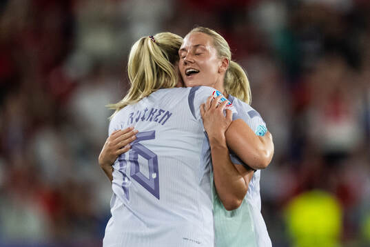 Mathilde Harviken and Lisa Naalsund of Norway celebrate