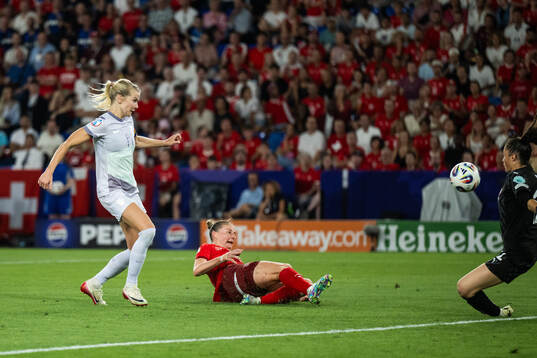 Ada Hegerberg of Norway sees the ball go past Julia Stierli
