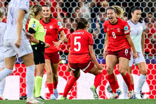 Nadine Riesen of Switzerland celebrates scoring 1-0