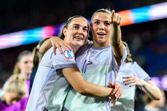 Vilde Bøe Risa and Celin Bizet Dønnum of Norway celebrate