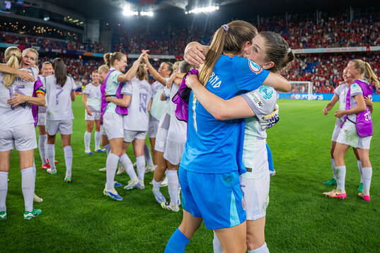 Goalkeeper Cecilie Fiskerstrand and Maren Mjelde of Norway