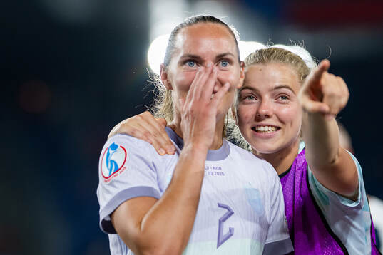 Marit Bratberg Lund and Justine Kielland of Norway celebrate