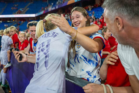 Ada Hegerberg of Norway celebrates with her friend Regine
