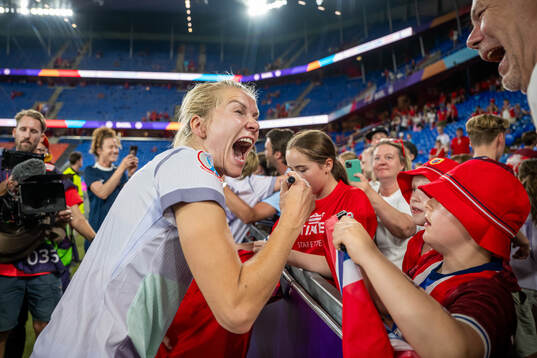 Ada Hegerberg of Norway celebrates with family and friends