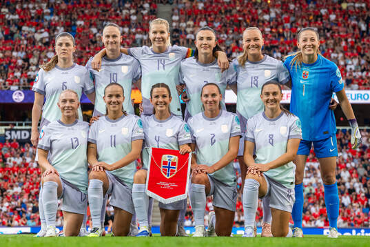 The starting eleven of Norway pose for a team photo