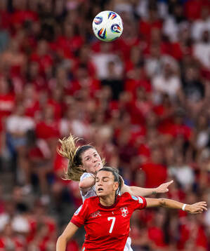 Maren Mjelde of Norway and Riola Xhemaili of Switzerland