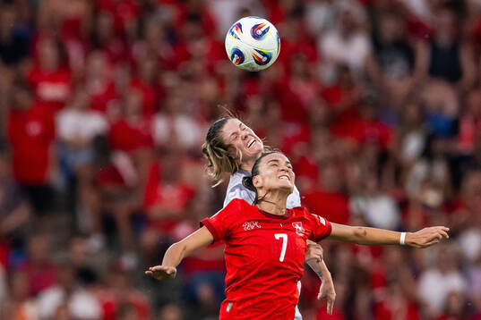 Maren Mjelde of Norway and Riola Xhemaili of Switzerland