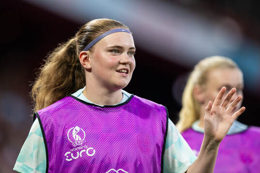Signe Gaupset of Norway warms up