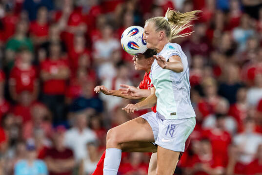 Nadine Riesen of Switzerland and Frida Maanum of Norway
