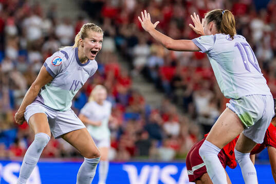 Ada Hegerberg and Caroline Graham Hansen of Norway celebrate