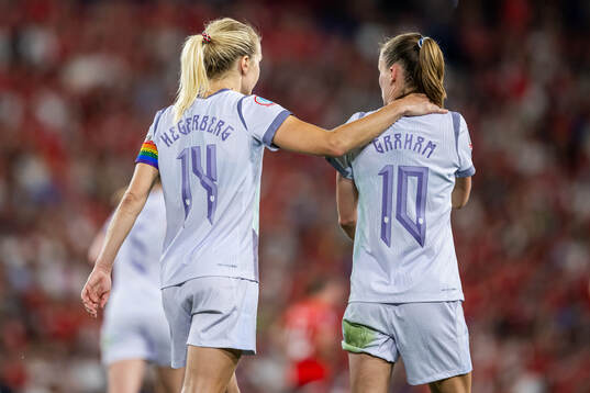 Ada Hegerberg and Caroline Graham Hansen of Norway celebrate