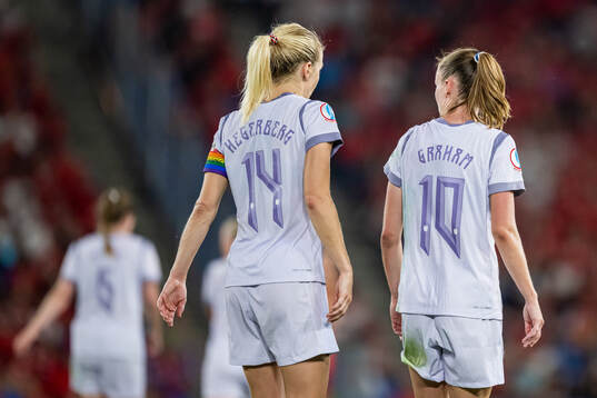 Ada Hegerberg and Caroline Graham Hansen of Norway celebrate