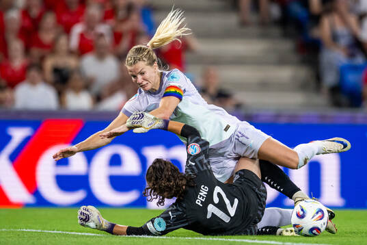 Ada Hegerberg of Norway and goalkeeper Livia Peng of