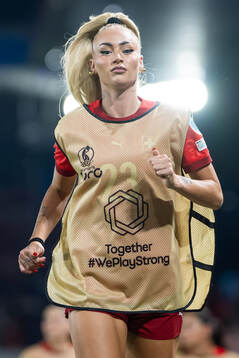 Alisha Lehmann of Switzerland warms up