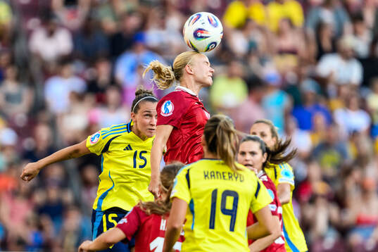 Pernille Harder of Denmark and Julia Zigiotti Olme of Sweden