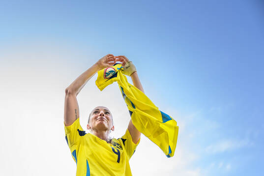 Kosovare Asllani of Sweden celebrates with a shirt