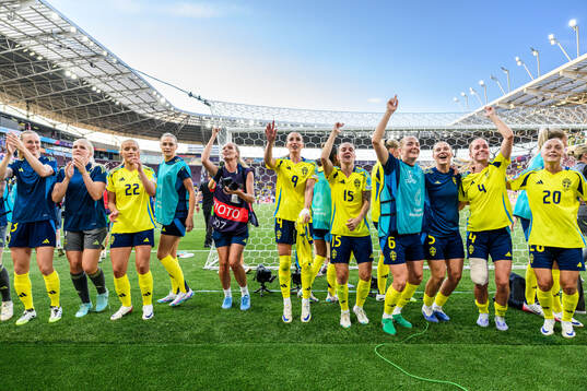 Players of Sweden celebrate