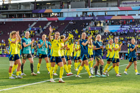 Players of Sweden celebrate