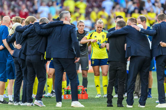 Goalkeeper Jennifer Falk and Stina Blackstenius of Sweden