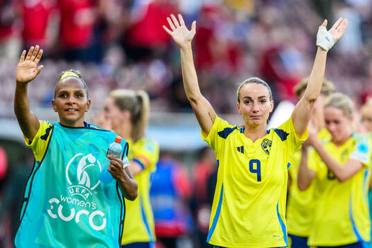 Madelen Janogy and Kosovare Asllani of Sweden celebrates
