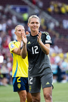 Goalkeeper Jennifer Falk of Sweden celebrates
