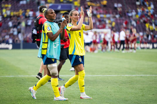 Madelen Janogy and Kosovare Asllani of Sweden