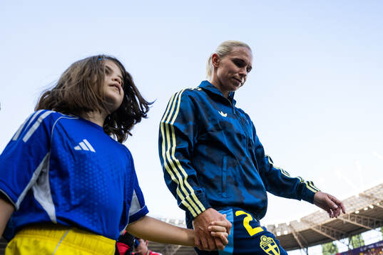 Jonna Andersson of Sweden enters the pitch