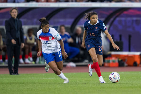 Jessica Carter of England and Delphine Cascarino of France