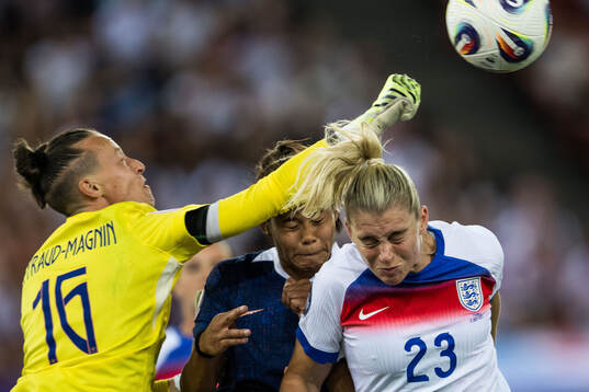 Goalkeeper Pauline Peyraud Magnin and Alice Sombath of