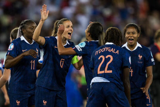 Sandie Toletti and Alice Sombath of France celebrates