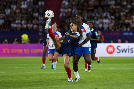 Maelle Lakrar of France and Michelle Agyemang of England
