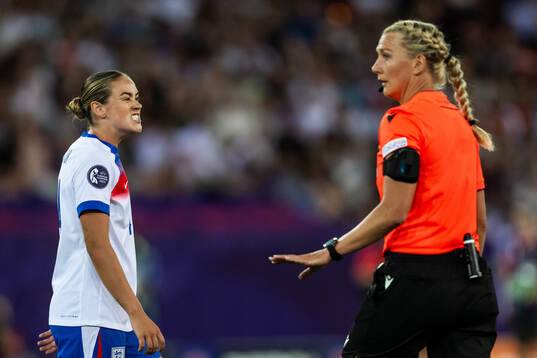 Grace Clinton of England reacts next to referee Tess