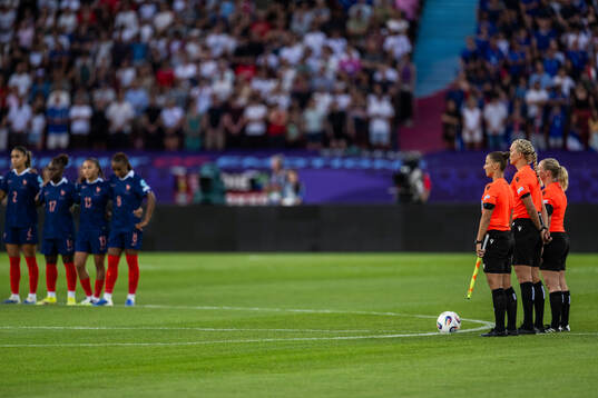 Assistant referee Almira Spahic, referee Tess Olofsson and