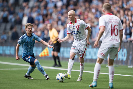 Djurgårdens Matias Siltanen och Degerfors Marcus Rafferty